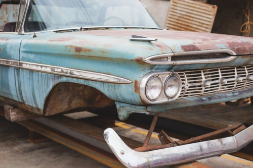 Rusty vintage car in need of repair